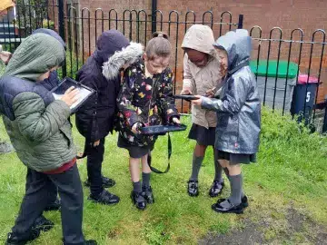 Group of pupils being habitat heroes