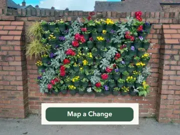 Green wall, with message to Map a Change