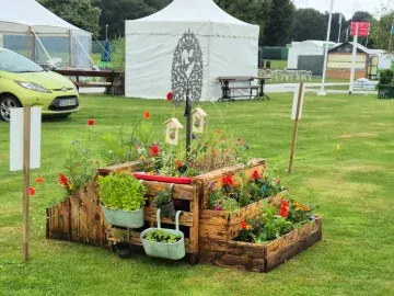 Wooden planter in field