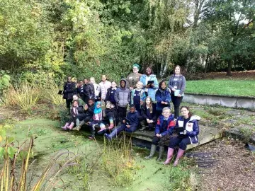 Nature park team members at a school