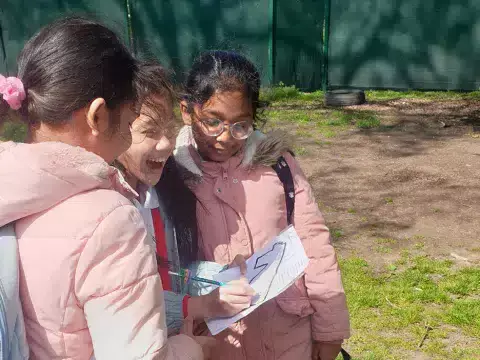 Pupils working together outside